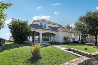 This stunning golf course lot home is located in a gated on The Golf Club at Resort Eagle Mountain Lake in Texas - for sale on GolfHomes.com, golf home, golf lot