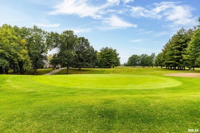 Nestled along the tranquil shores of a pristine lake, this on Carlinville Country Club in Illinois - for sale on GolfHomes.com, golf home, golf lot