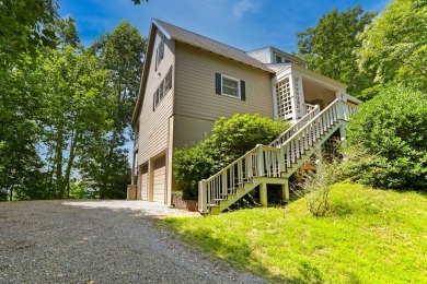 Experience serene living with panoramic mountain and golf course on Brasstown Valley Resort and Spa in Georgia - for sale on GolfHomes.com, golf home, golf lot