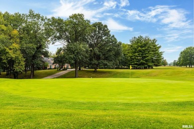 Nestled along the tranquil shores of a pristine lake, this on Carlinville Country Club in Illinois - for sale on GolfHomes.com, golf home, golf lot