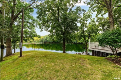 Nestled along the tranquil shores of a pristine lake, this on Carlinville Country Club in Illinois - for sale on GolfHomes.com, golf home, golf lot