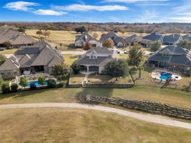 This stunning golf course lot home is located in a gated on The Golf Club at Resort Eagle Mountain Lake in Texas - for sale on GolfHomes.com, golf home, golf lot