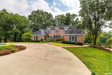 Nestled along the tranquil shores of a pristine lake, this on Carlinville Country Club in Illinois - for sale on GolfHomes.com, golf home, golf lot