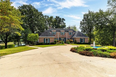 Nestled along the tranquil shores of a pristine lake, this on Carlinville Country Club in Illinois - for sale on GolfHomes.com, golf home, golf lot