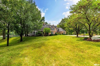 Nestled along the tranquil shores of a pristine lake, this on Carlinville Country Club in Illinois - for sale on GolfHomes.com, golf home, golf lot