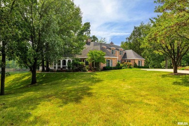 Nestled along the tranquil shores of a pristine lake, this on Carlinville Country Club in Illinois - for sale on GolfHomes.com, golf home, golf lot