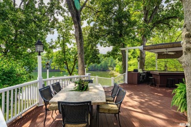 Nestled along the tranquil shores of a pristine lake, this on Carlinville Country Club in Illinois - for sale on GolfHomes.com, golf home, golf lot