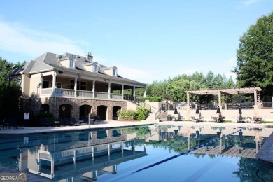 Experience refined St Marlo Country Club living at its finest in on St. Marlo Country Club in Georgia - for sale on GolfHomes.com, golf home, golf lot