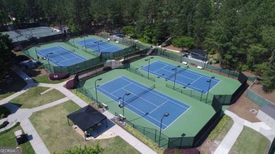 Experience refined St Marlo Country Club living at its finest in on St. Marlo Country Club in Georgia - for sale on GolfHomes.com, golf home, golf lot