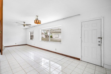 Welcome to this charming 2-bed, 2-bath single-family home on a on Leisureville Community Golf Course in Florida - for sale on GolfHomes.com, golf home, golf lot