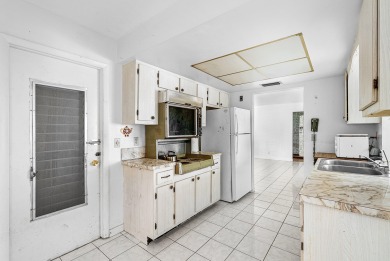 Welcome to this charming 2-bed, 2-bath single-family home on a on Leisureville Community Golf Course in Florida - for sale on GolfHomes.com, golf home, golf lot