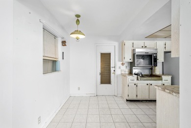 Welcome to this charming 2-bed, 2-bath single-family home on a on Leisureville Community Golf Course in Florida - for sale on GolfHomes.com, golf home, golf lot