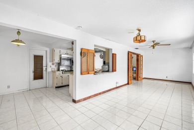 Welcome to this charming 2-bed, 2-bath single-family home on a on Leisureville Community Golf Course in Florida - for sale on GolfHomes.com, golf home, golf lot