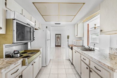 Welcome to this charming 2-bed, 2-bath single-family home on a on Leisureville Community Golf Course in Florida - for sale on GolfHomes.com, golf home, golf lot