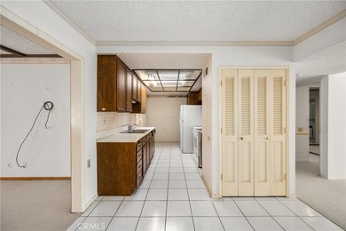 Wonderful single-level home perfectly situated on a peaceful on Leisure Village Par 3 Golf Course in California - for sale on GolfHomes.com, golf home, golf lot