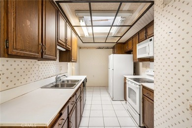 Wonderful single-level home perfectly situated on a peaceful on Leisure Village Par 3 Golf Course in California - for sale on GolfHomes.com, golf home, golf lot