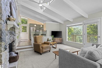 Welcome to a completely updated and enchanting 4-bedroom, 4-bath on Manitou Passage Golf Club in Michigan - for sale on GolfHomes.com, golf home, golf lot