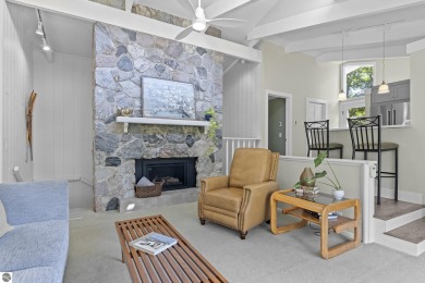 Welcome to a completely updated and enchanting 4-bedroom, 4-bath on Manitou Passage Golf Club in Michigan - for sale on GolfHomes.com, golf home, golf lot