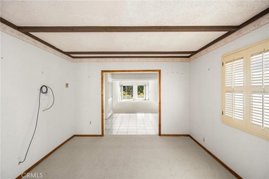 Wonderful single-level home perfectly situated on a peaceful on Leisure Village Par 3 Golf Course in California - for sale on GolfHomes.com, golf home, golf lot