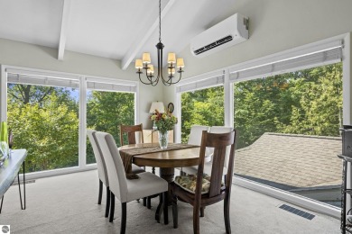 Welcome to a completely updated and enchanting 4-bedroom, 4-bath on Manitou Passage Golf Club in Michigan - for sale on GolfHomes.com, golf home, golf lot