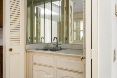 Wonderful single-level home perfectly situated on a peaceful on Leisure Village Par 3 Golf Course in California - for sale on GolfHomes.com, golf home, golf lot