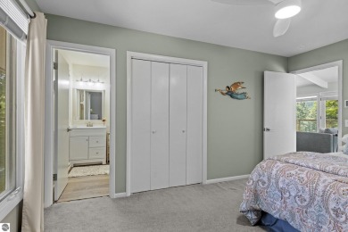 Welcome to a completely updated and enchanting 4-bedroom, 4-bath on Manitou Passage Golf Club in Michigan - for sale on GolfHomes.com, golf home, golf lot