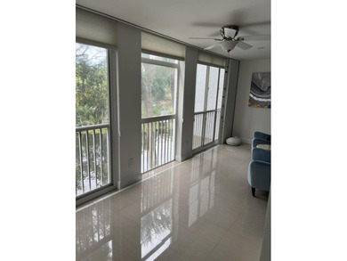 COUNTRY CLUB LIVING AT ITS FINEST 2 BEDROOM 2 BATHROOM CONDO on  in Florida - for sale on GolfHomes.com, golf home, golf lot