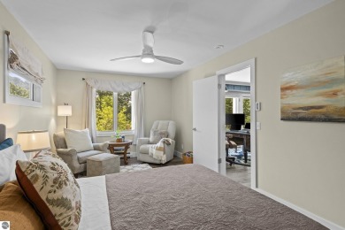 Welcome to a completely updated and enchanting 4-bedroom, 4-bath on Manitou Passage Golf Club in Michigan - for sale on GolfHomes.com, golf home, golf lot