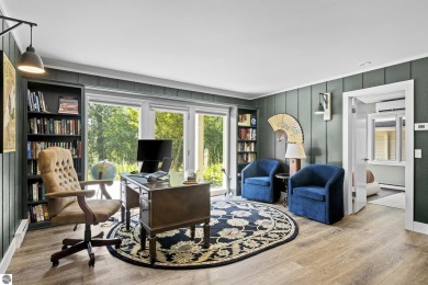Welcome to a completely updated and enchanting 4-bedroom, 4-bath on Manitou Passage Golf Club in Michigan - for sale on GolfHomes.com, golf home, golf lot