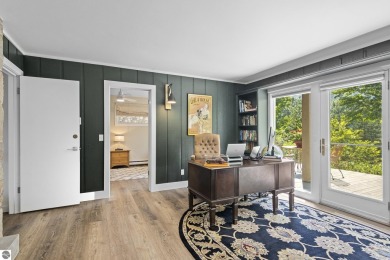 Welcome to a completely updated and enchanting 4-bedroom, 4-bath on Manitou Passage Golf Club in Michigan - for sale on GolfHomes.com, golf home, golf lot