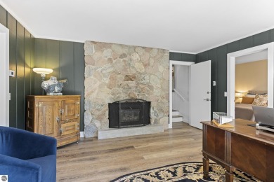 Welcome to a completely updated and enchanting 4-bedroom, 4-bath on Manitou Passage Golf Club in Michigan - for sale on GolfHomes.com, golf home, golf lot