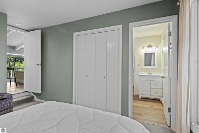 Welcome to a completely updated and enchanting 4-bedroom, 4-bath on Manitou Passage Golf Club in Michigan - for sale on GolfHomes.com, golf home, golf lot