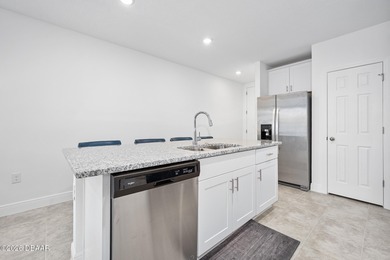 Do not miss this amazing opportunity to own a practically NEW on LPGA International Golf Course in Florida - for sale on GolfHomes.com, golf home, golf lot