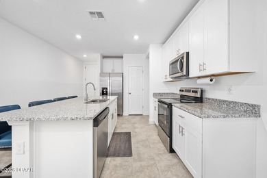 Do not miss this amazing opportunity to own a practically NEW on LPGA International Golf Course in Florida - for sale on GolfHomes.com, golf home, golf lot