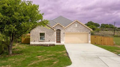 This fresh and functional 3-bedroom, 2-bath home offers style on The Club At Runaway Bay in Texas - for sale on GolfHomes.com, golf home, golf lot