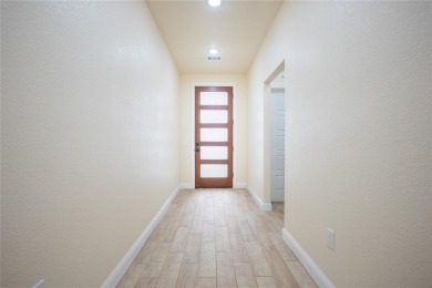 This fresh and functional 3-bedroom, 2-bath home offers style on The Club At Runaway Bay in Texas - for sale on GolfHomes.com, golf home, golf lot