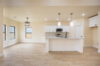 This fresh and functional 3-bedroom, 2-bath home offers style on The Club At Runaway Bay in Texas - for sale on GolfHomes.com, golf home, golf lot