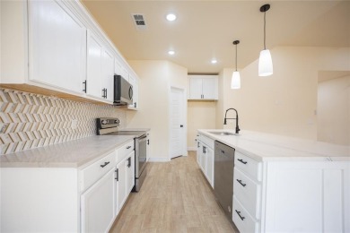 This fresh and functional 3-bedroom, 2-bath home offers style on The Club At Runaway Bay in Texas - for sale on GolfHomes.com, golf home, golf lot