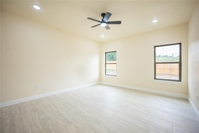 This fresh and functional 3-bedroom, 2-bath home offers style on The Club At Runaway Bay in Texas - for sale on GolfHomes.com, golf home, golf lot