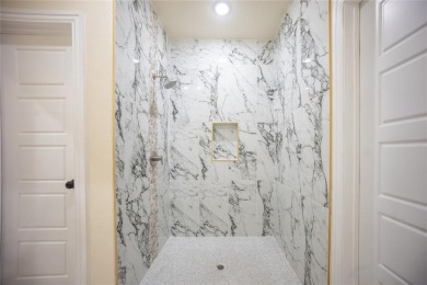 This fresh and functional 3-bedroom, 2-bath home offers style on The Club At Runaway Bay in Texas - for sale on GolfHomes.com, golf home, golf lot