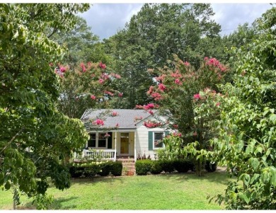 Charming 1949 cottage on one of the best streets in East Lake on East Lake Golf Club in Georgia - for sale on GolfHomes.com, golf home, golf lot