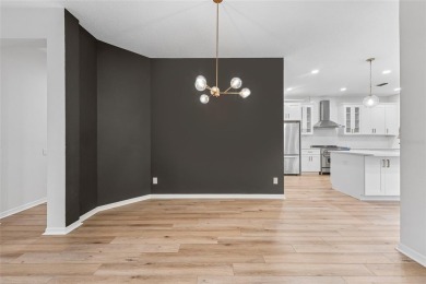 Welcome to your dream home at 9402 Woodbay Drive, where modern on Westchase Golf Club in Florida - for sale on GolfHomes.com, golf home, golf lot