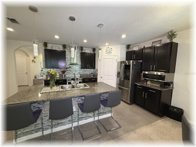 SE - DIRECTLY ON THE GOLF COURSE - WITH LOTS OF SMART HOME on Lake Diamond Golf and Country Club in Florida - for sale on GolfHomes.com, golf home, golf lot