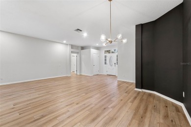 Welcome to your dream home at 9402 Woodbay Drive, where modern on Westchase Golf Club in Florida - for sale on GolfHomes.com, golf home, golf lot
