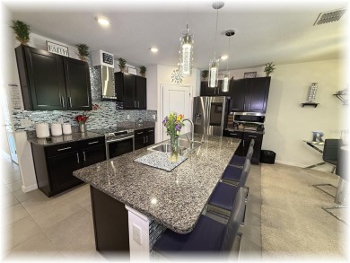 SE - DIRECTLY ON THE GOLF COURSE - WITH LOTS OF SMART HOME on Lake Diamond Golf and Country Club in Florida - for sale on GolfHomes.com, golf home, golf lot