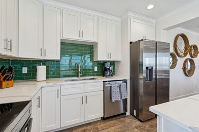 Fully updated, beach front stunner! Situated on the highly on Key Royale Club in Florida - for sale on GolfHomes.com, golf home, golf lot