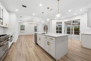 Welcome to your dream home at 9402 Woodbay Drive, where modern on Westchase Golf Club in Florida - for sale on GolfHomes.com, golf home, golf lot