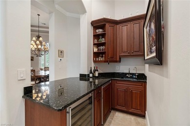 Prepare to be captivated by this extraordinary estate in Shadow on Shadow Wood Preserve in Florida - for sale on GolfHomes.com, golf home, golf lot