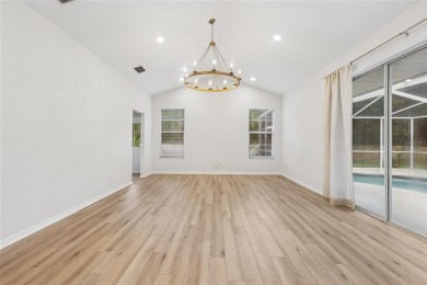 Welcome to your dream home at 9402 Woodbay Drive, where modern on Westchase Golf Club in Florida - for sale on GolfHomes.com, golf home, golf lot