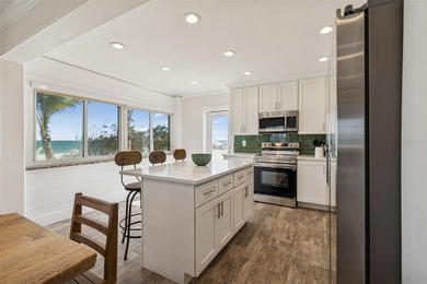 Fully updated, beach front stunner! Situated on the highly on Key Royale Club in Florida - for sale on GolfHomes.com, golf home, golf lot